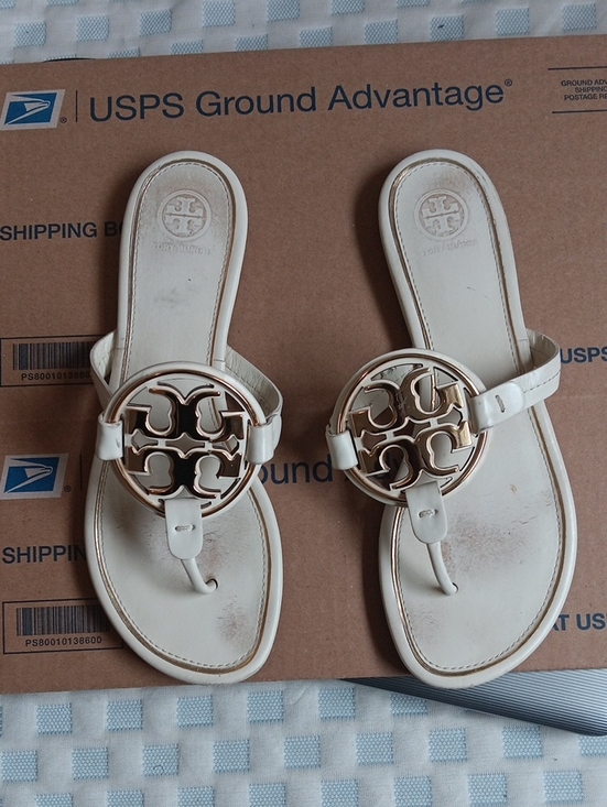 Tory Burch Shoes - Tory Burch Ivory Leather Logo Thong Sandals with Gold Medallions